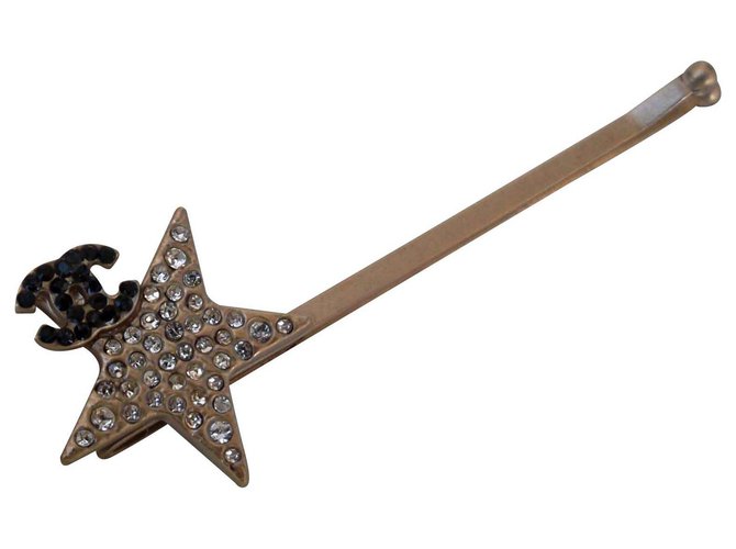Chanel KIRBY STAR CLAMP Dourado Metal  ref.146793