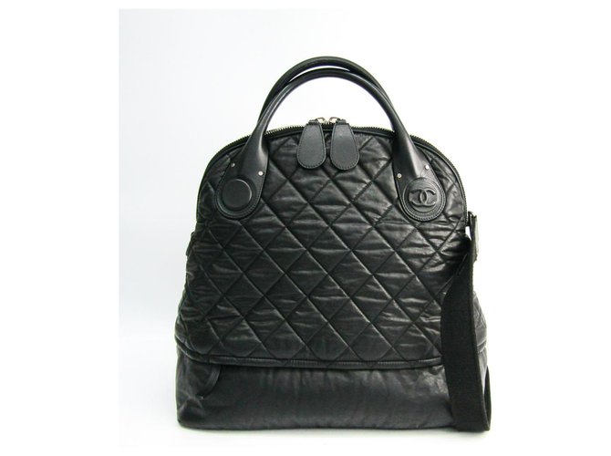 Chanel Black Matelasse Travel Bag Leather Cloth Cloth  ref.147540