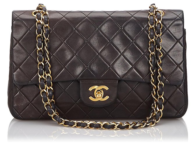 Timeless Chanel Black Medium Flap Bag mit Lammfellfutter Schwarz Leder  ref.149283