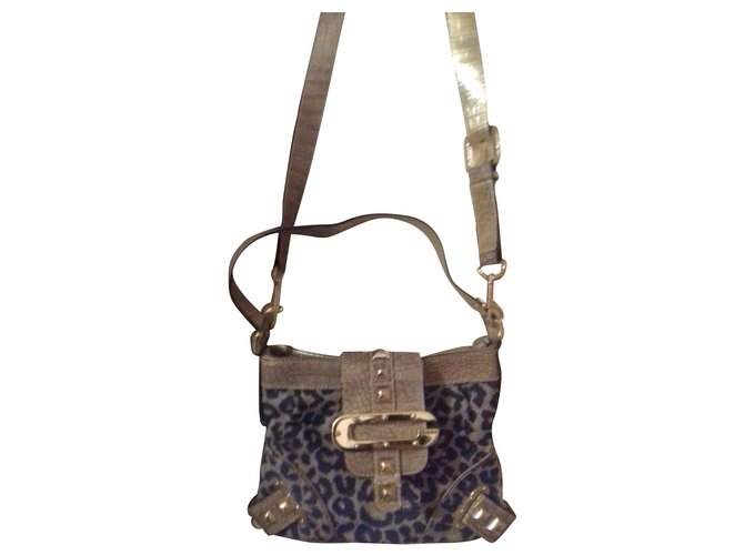Guess Handbags Leopard print Cotton  ref.150821