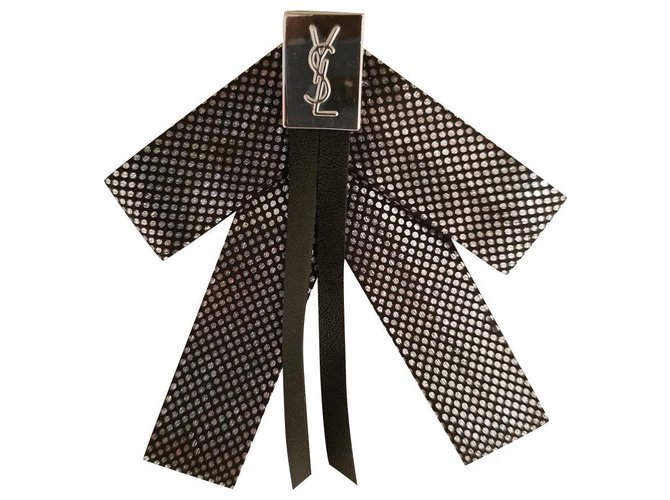 Yves Saint Laurent Pins & brooches Black Synthetic  ref.151059