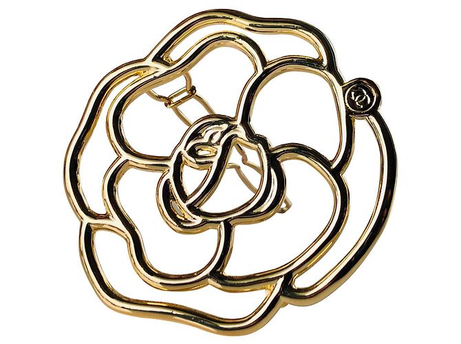 Chanel Camélia de cabeça Dourado
