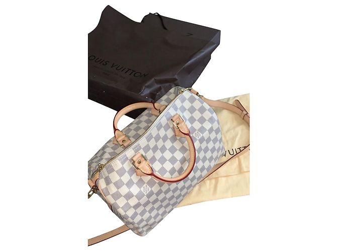 Louis Vuitton Speedy shoulder strap Beige