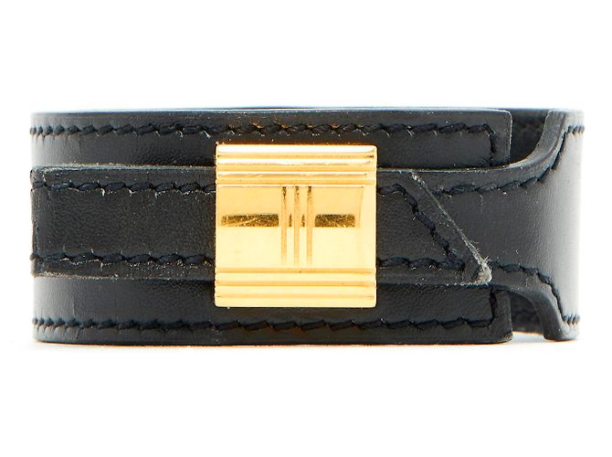 Pulseira Hermès Artemis em couro preto e metal dourado