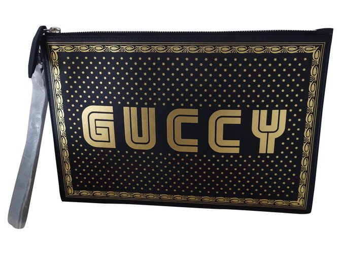 Gucci GUCCY clutch Black Golden Leather  ref.156249