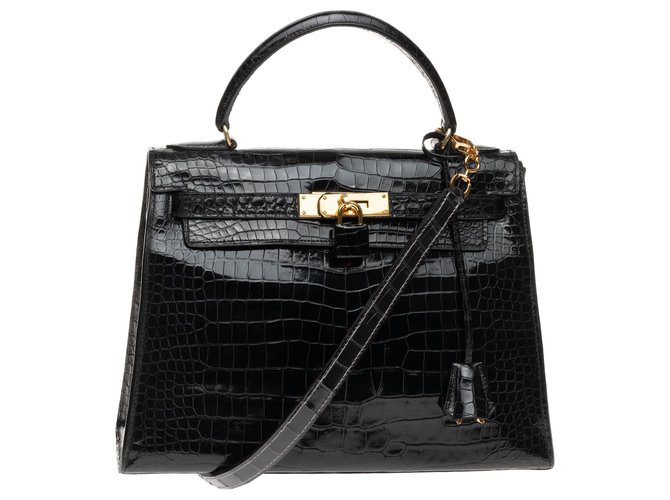 Sublime Hermès Kelly Bag 28cm saddle strap in Crocodile Porosus black, gold-plated jewelery Exotic leather  ref.157078