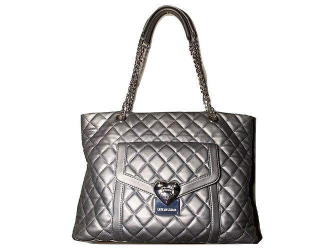 Love Moschino saco prateado acolchoado