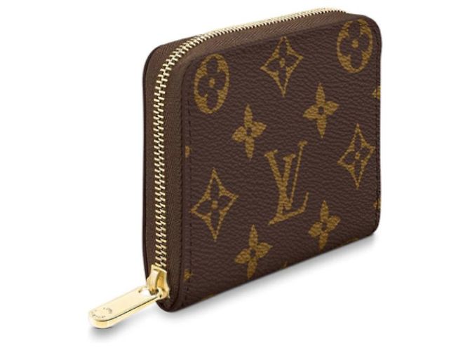 Louis Vuitton Zippy coin new Brown