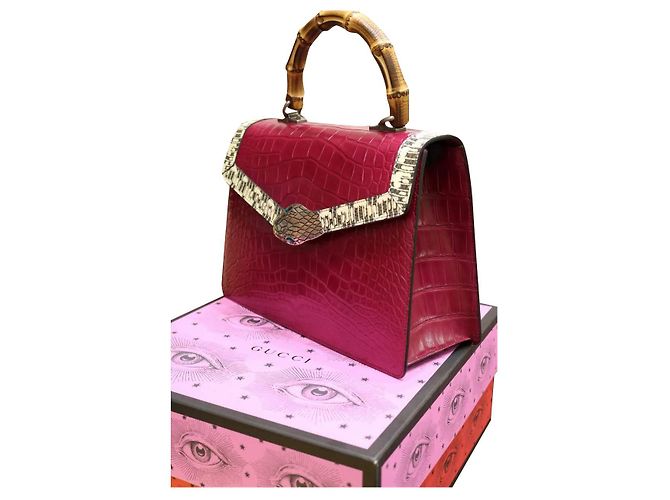 Bolsa de mão Gucci em couro ameixa