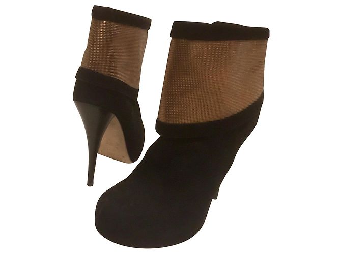 Fendi Botines negros y dorados