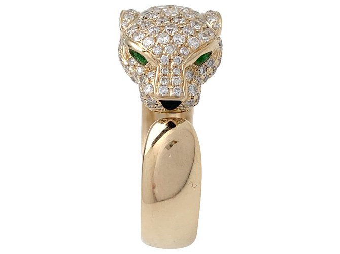 Cartier ring "Panthère" model in yellow gold, onyx, emeralds and diamonds.  ref.167380