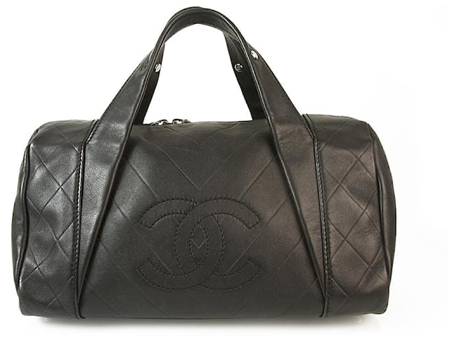 CHANEL Black Leather Medium Bowling bag with V Quilted and with leather handles  ref.167579