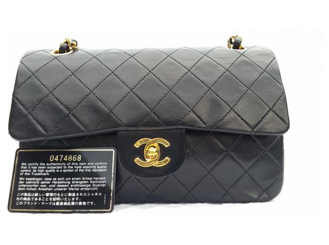 Chanel Matelasse clássico 2.55 saco de aleta alinhado Preto Pele de cordeiro  ref.168392