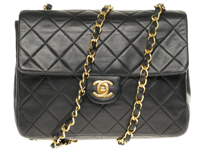 Superb Chanel Mini Timeless in quilted lambskin with golden jewelry Black Leather  ref.169264