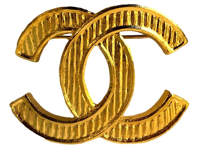 Chanel Pino DC Dourado Metal  ref.170253