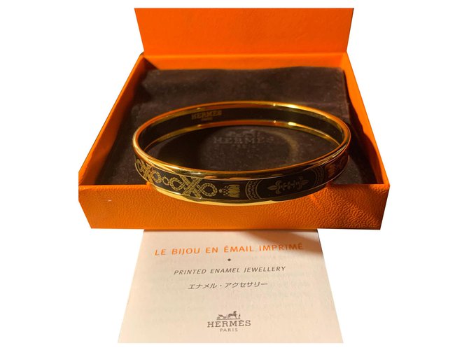 Quase nova pulseira Hermès Grand Apparat Preto Banhado a ouro  ref.170959