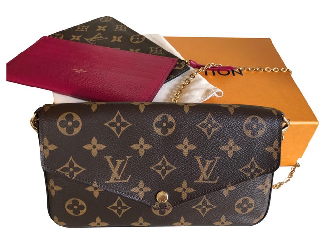 Florentine cloth clutch bag Louis Vuitton Brown in Cloth - 33985736