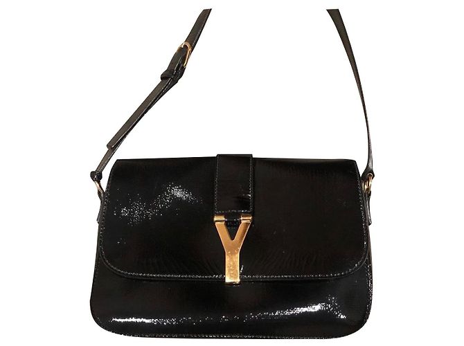 Borsa a mano Saint Laurent in pelle nera e oro Nero