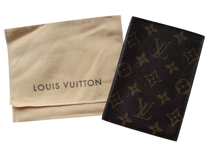 Louis Vuitton Porta pasaporte de lona Monogram. Marrón oscuro Lienzo  ref.174041