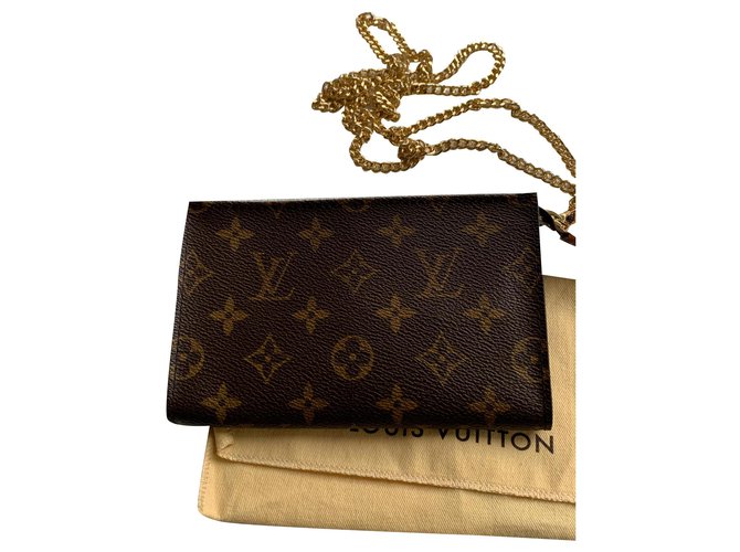 Bucket Louis Vuitton Clutch bags Brown Cloth  ref.174924