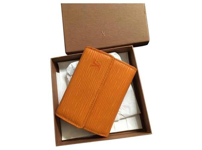 Louis Vuitton Purses, wallets, cases Orange Leather  ref.175825