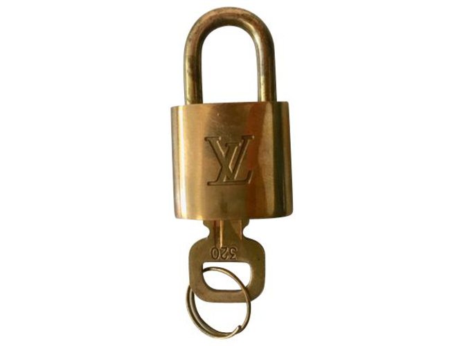 Louis Vuitton Lock Golden Metal  ref.177263