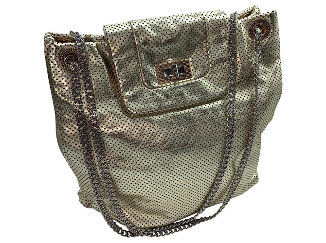 Chanel Handbags Golden Leather  ref.177549