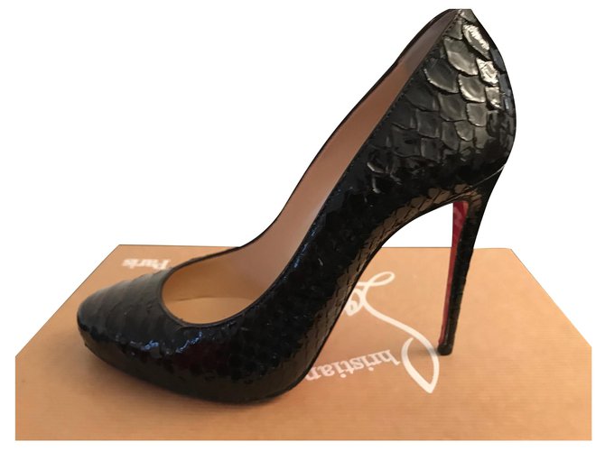 Christian Louboutin LOUBOUTIN Pumps Dark red Exotic leather  ref.180003