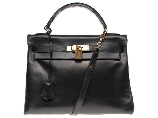 Superbe Sac Hermès Kelly 3é retourné bandoulière en cuir box noir, garniture en métal plaqué or  ref.180102