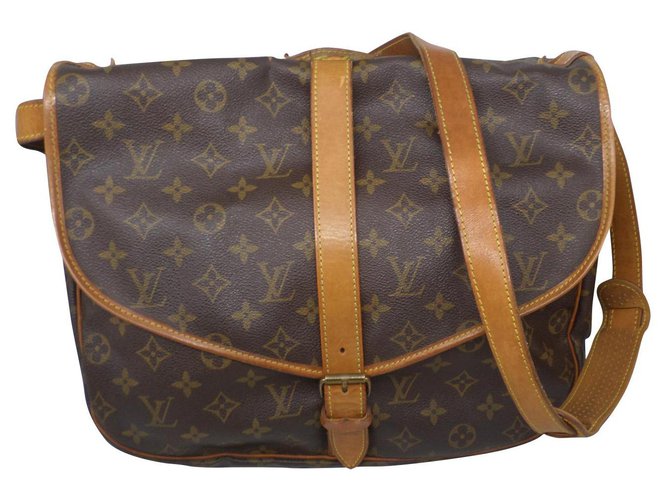 Saumur Louis Vuitton Handbags Brown Cloth  ref.180443