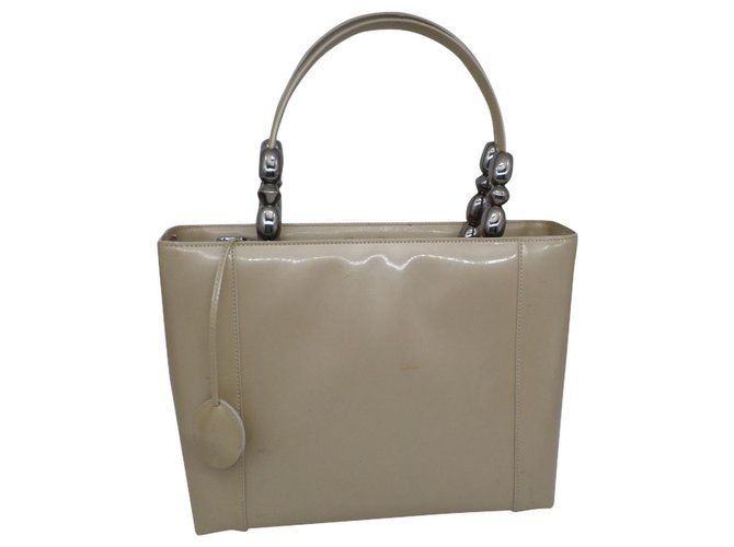 Dior Handbags Beige Patent leather  ref.181472