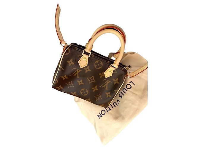 Bolsa de mão Louis Vuitton Nano Speedy em couro marrom