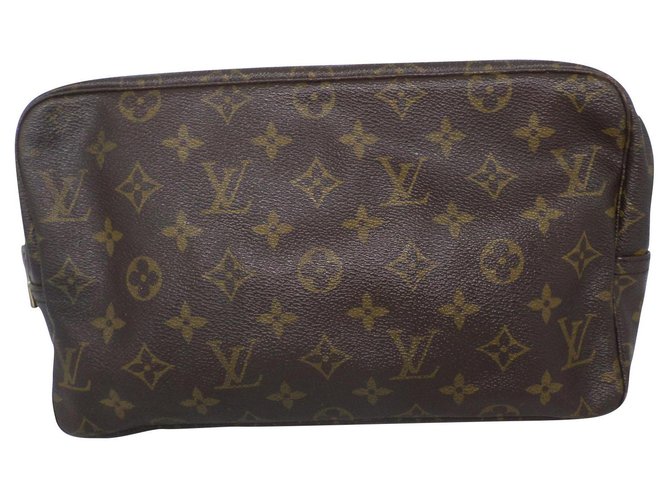 Louis Vuitton Clutch bags Brown Cloth  ref.183811
