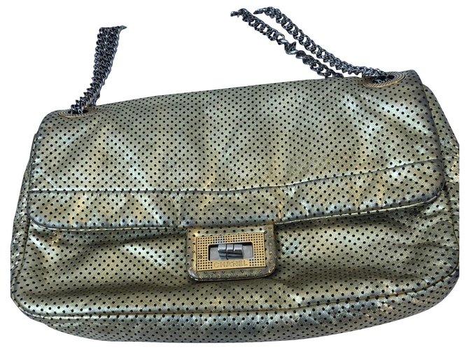 Chanel Handbags Golden Leather  ref.184138