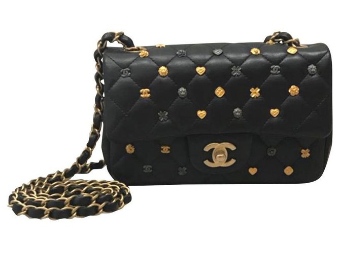 Timeless Limited edition Chanel mini lucky charms flap bag. Black