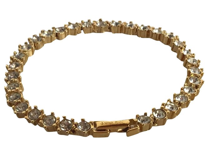Nina Ricci Tennisarmband Golden Metall  ref.184548