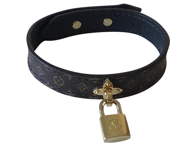 Superbe bracelet Louis Vuitton neuf avec cadenas Toile Marron  ref.184845