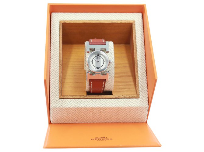 Hermès Paprika watch with a brown leather strap.  ref.184872