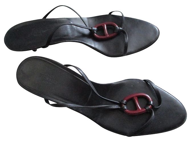 Hermès Mules Kala, pointure 38IT. Noir