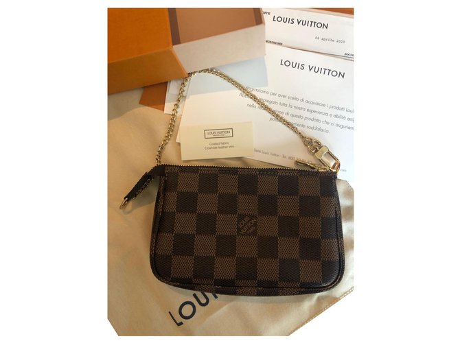 Louis Vuitton Brown Damier ebene Canvas Mini Pochette Accessoires handbag  Louis Vuitton