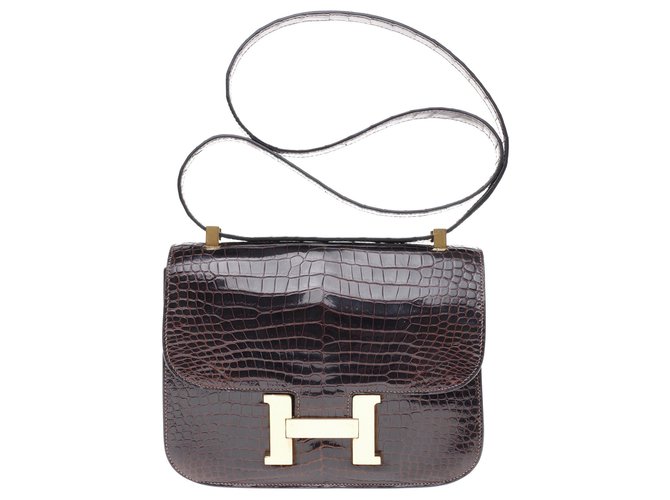 Sublime Hermès Constance in brown porosus crocodile, gold-plated metal trim in very good condition! Exotic leather  ref.191069
