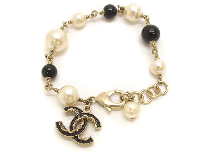 Chanel Gold Tone CC Camellia Flower Pearl Bracelet – The Closet