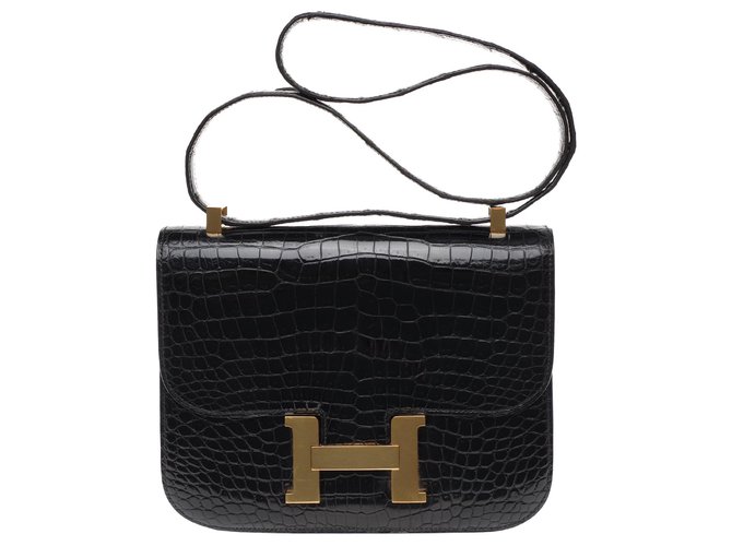 Exceptionnel Hermès Constance 23 en Crocodile porosus noir, garniture en métal plaqué or Cuirs exotiques  ref.193711
