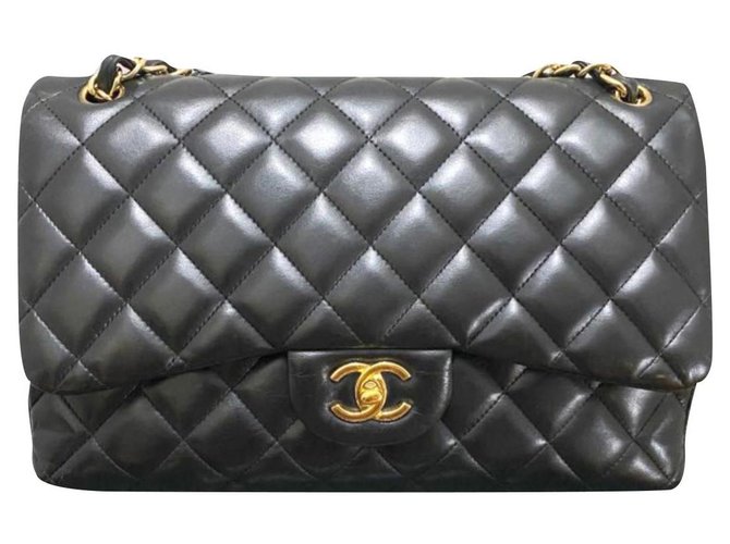 Timeless Chanel preto pele de carneiro Jumbo clássico alinhado saco de aba Couro  ref.195137
