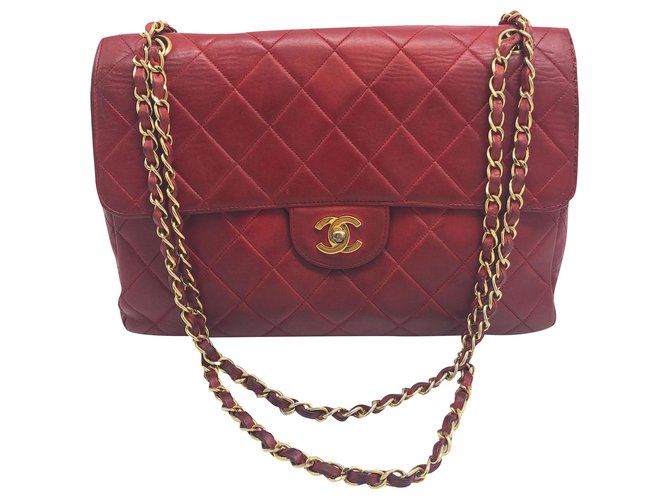 Chanel Timeless lined sided bag in red quilted lambskin.  ref.197421