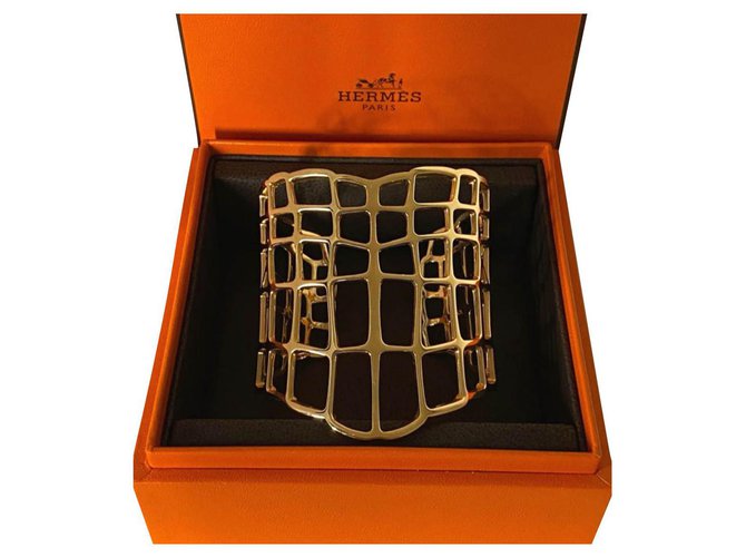 Hermès Hermes Large Niloticulus cuff Golden Yellow gold  ref.198528