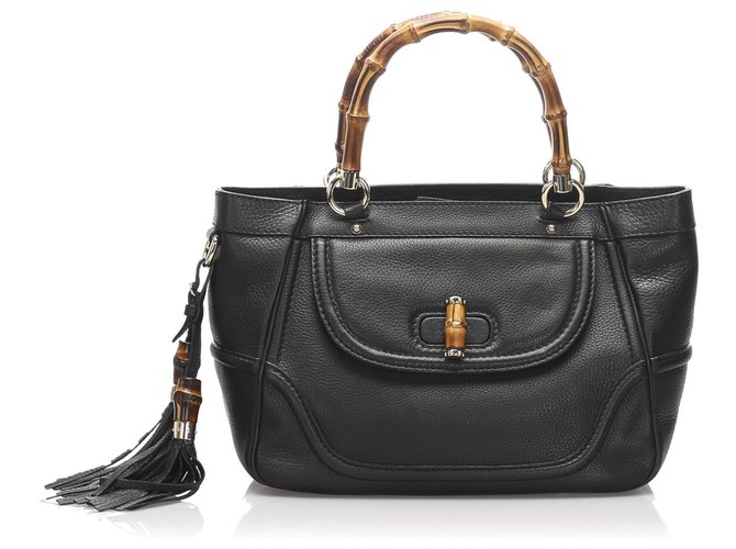 gucci black tassel bag