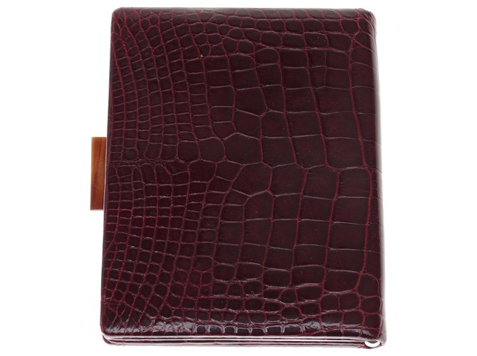 Cartier wallet / card holder in burgundy porosus crocodile leather, silver metal frame in superb condition Dark red Exotic leather  ref.201109
