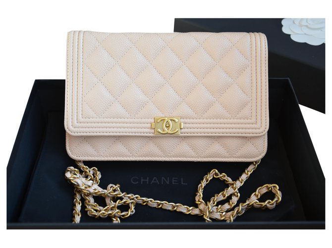 Chanel WOC Wallet on Chain Boy bag in beige caviar leather Silvery Golden  ref.202963 - Joli Closet
