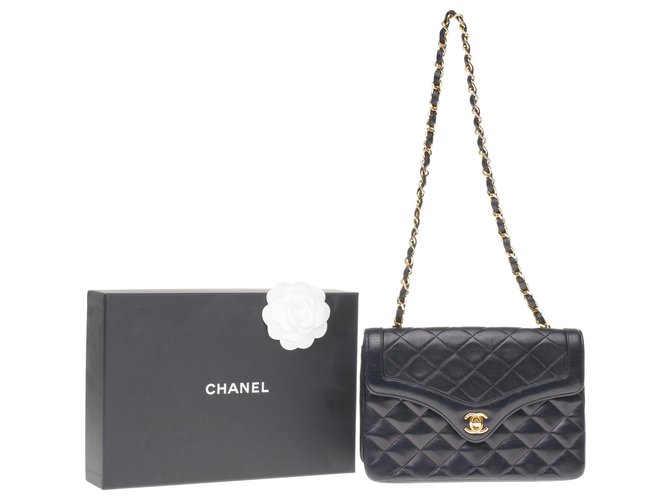 Timeless Splendida mini borsa Chanel classica in pelle trapuntata blu navy, garniture en métal doré  ref.203129